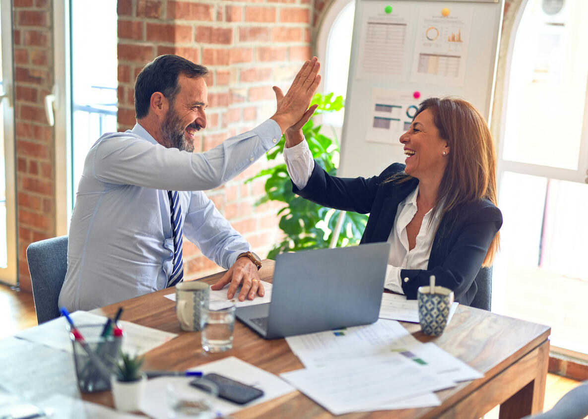Long nails painted a shade of baby blue.