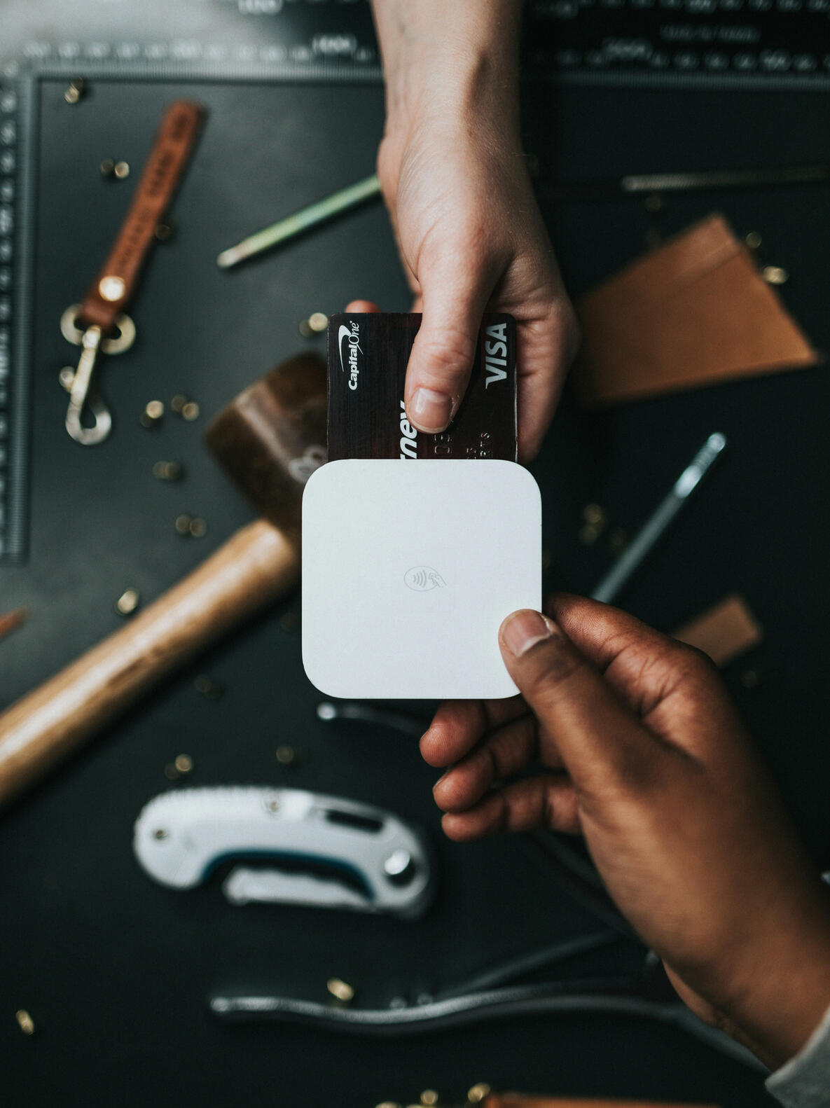 Long nails painted a shade of baby blue.